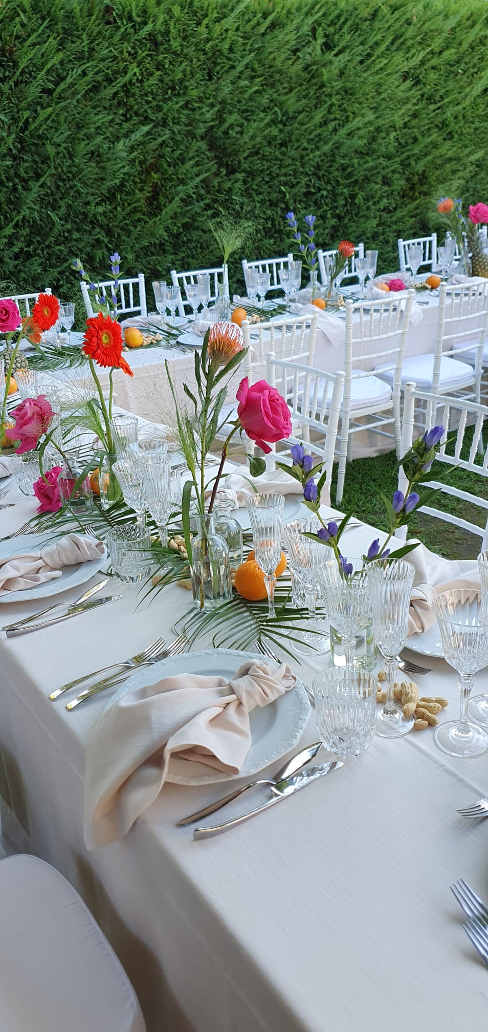 Elegant long table prepared for guests in Tuscany